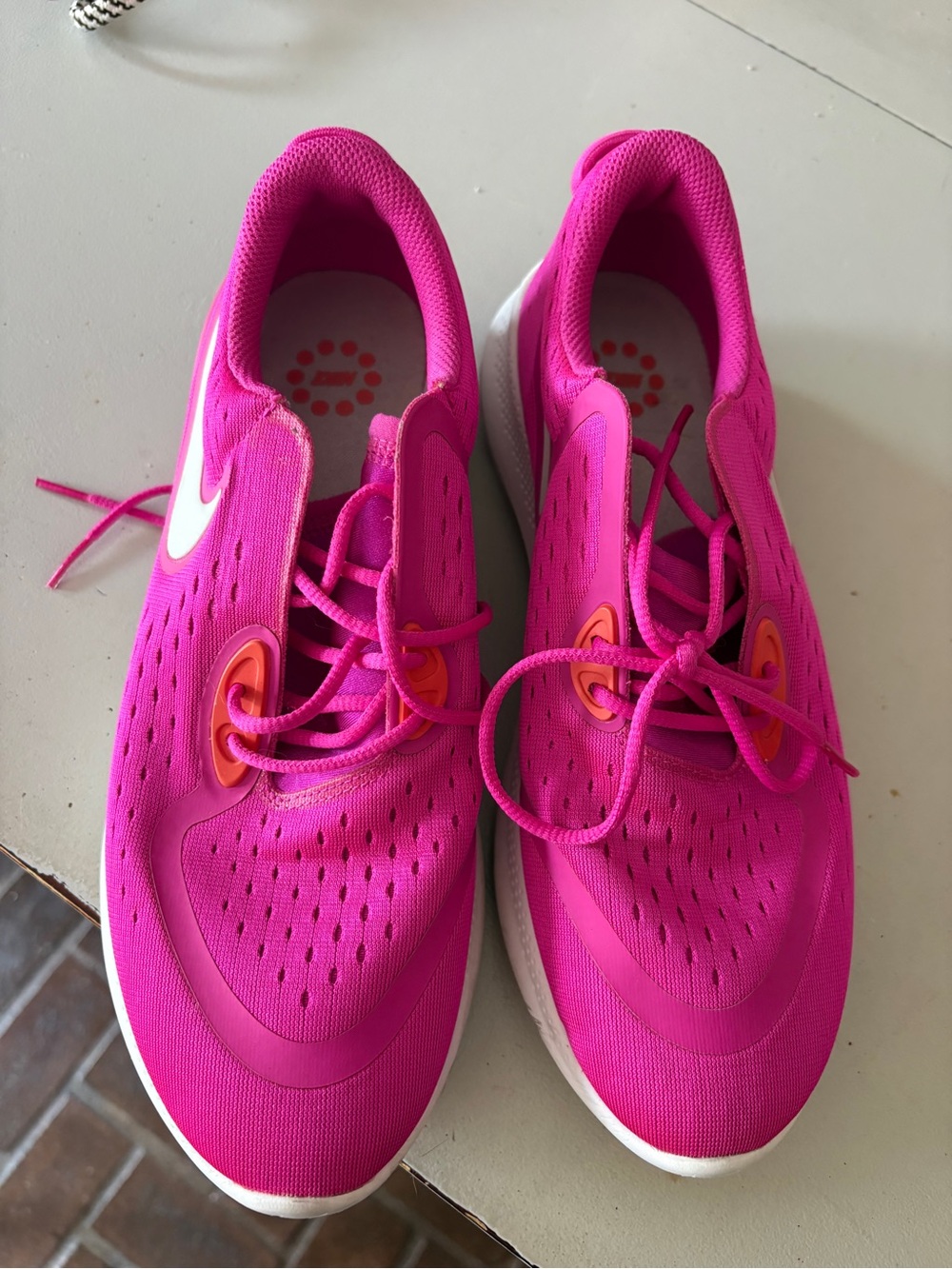 Bright Pink Athletic Sneakers with White Swoosh Nike